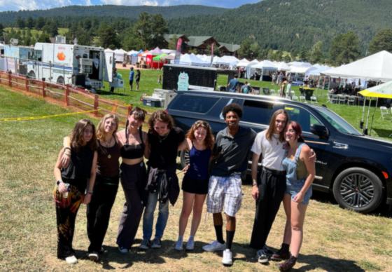 Black SUV at a Colorado summer festival